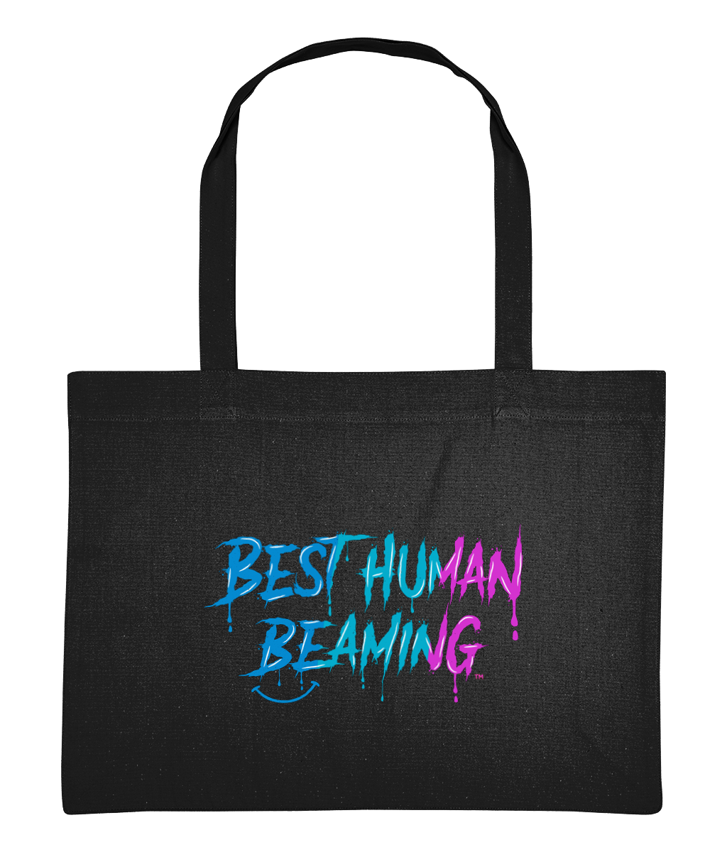 Large black tote bag with long handles, featuring the “Best Human Beaming” logo in a bold blue-to-pink graffiti style. Eco-friendly, vegan tote bag made from recycled cotton and polyester—perfect for shopping, beach days, or everyday use.
