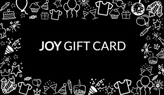 Black Joy Gift Card with white text and playful party icons including t-shirts, balloons, gifts, and cake. Represents gifting happiness and celebration with Best Human Beaming.