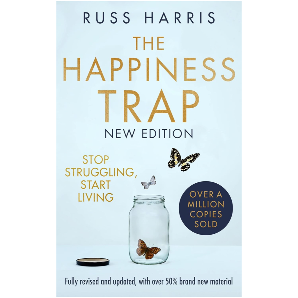 Book cover of “The Happiness Trap” by Russ Harris, featuring a glass jar with butterflies inside and flying free against a clean white background. A practical guide to overcoming stress and finding real happiness through acceptance and mindfulness.